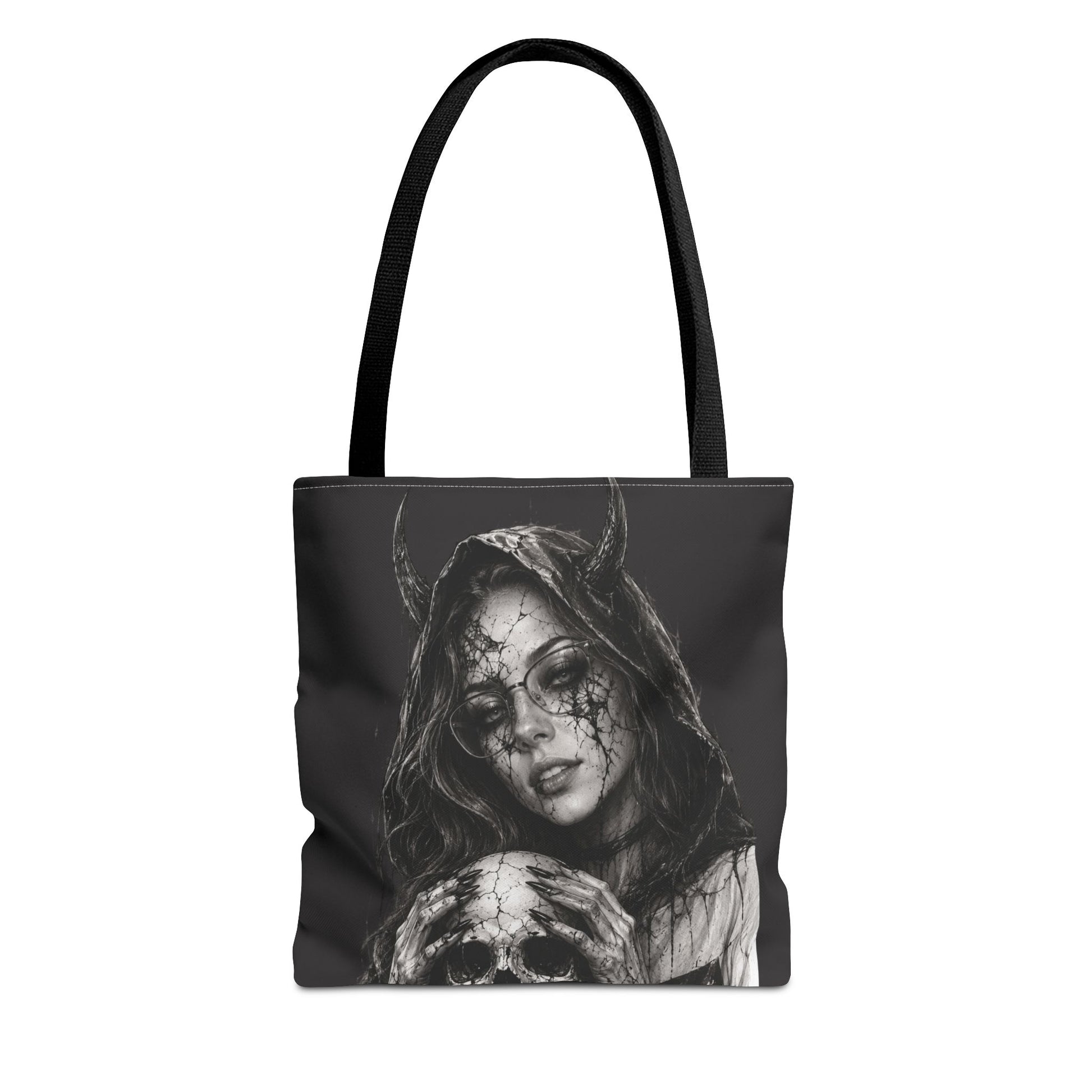 Tote bag with a black and white design of a hooded figure with horns and a skull on a white background
