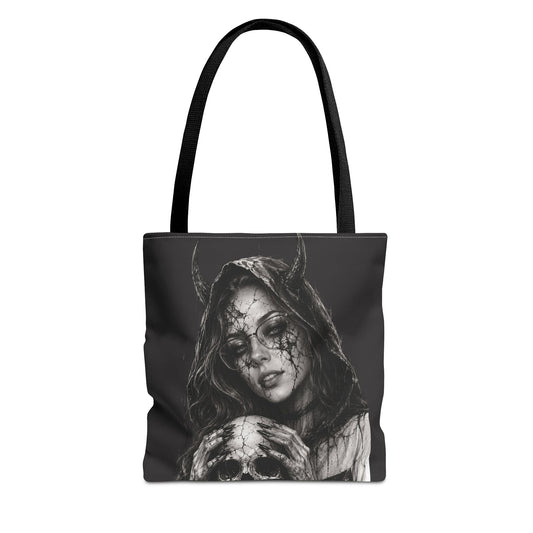 Tote bag with a black and white design of a hooded figure with horns and a skull on a white background