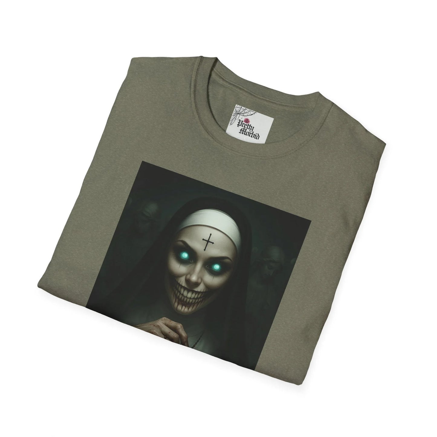 Folded gothic t-shirt with eerie glowing-eyed nun and cross on forehead, dark art style