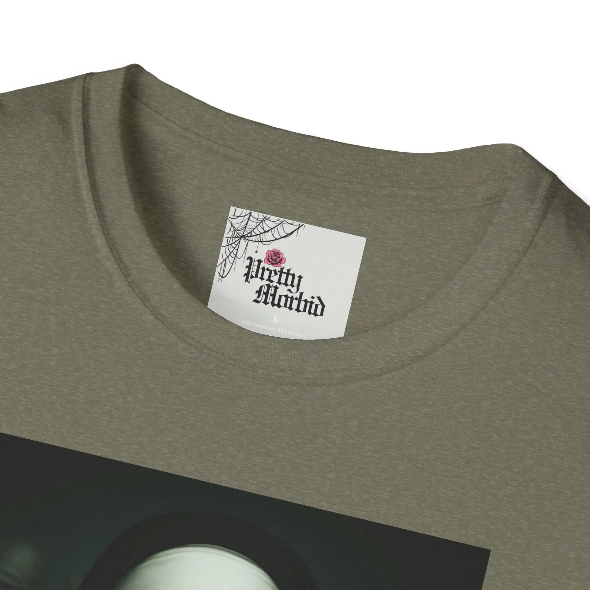 Close-up of gothic graphic t-shirt neckline with printed tag and spiderweb design