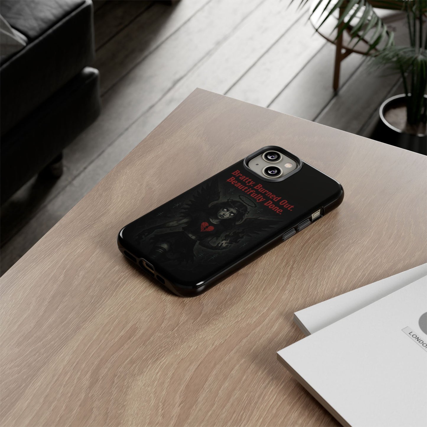 Phone case with a design on a wooden surface