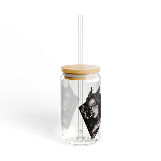 Clear tumbler with bamboo lid and straw featuring a graphic design on a white background