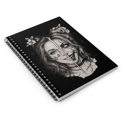 Spiral-bound notebook with a black and white illustration of a woman's face on the cover.