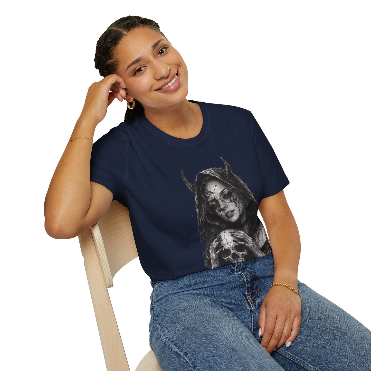 Woman wearing a black t-shirt with colorful graphics and text, sitting on a chair.