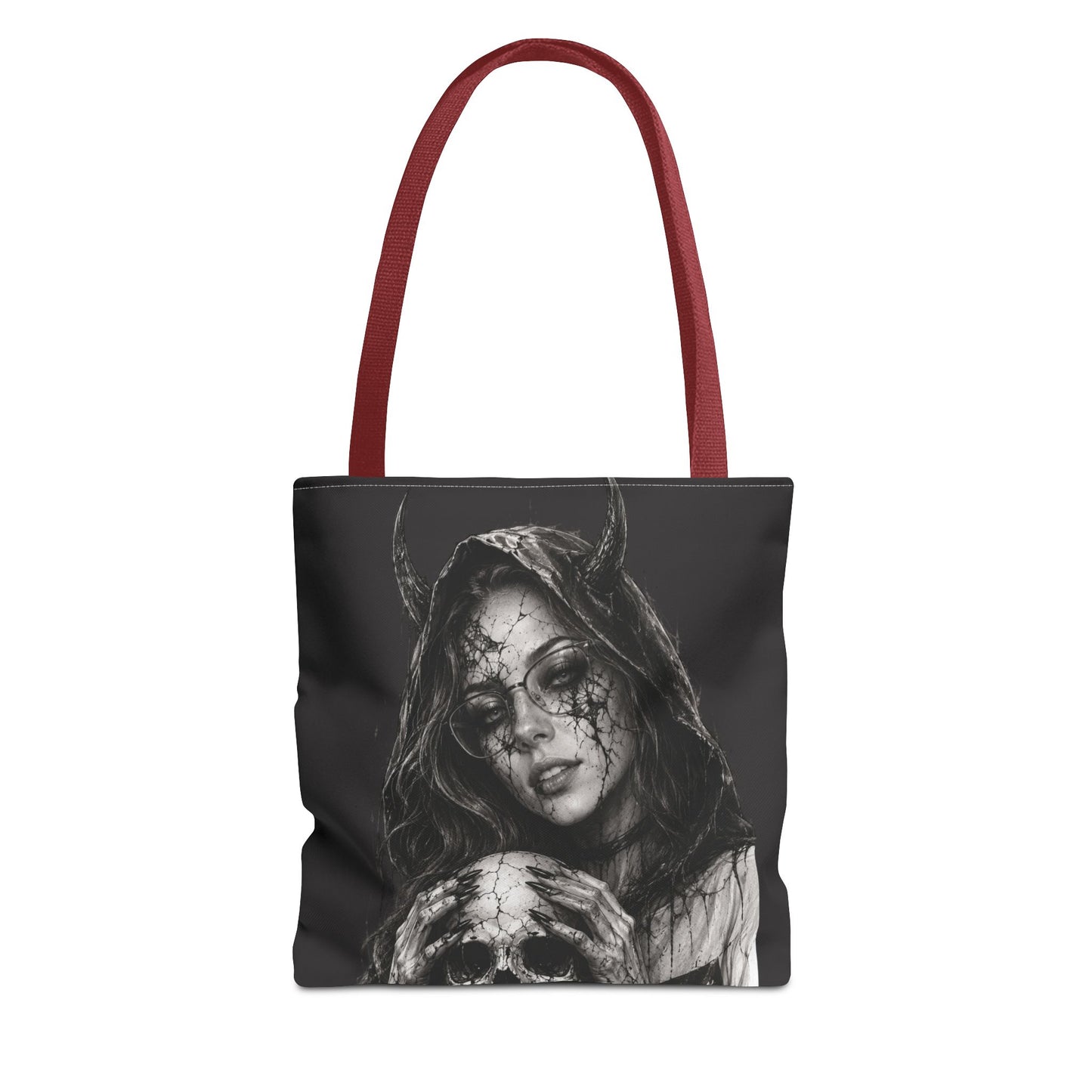 Tote bag with a design of a hooded figure holding a skull on a black background.