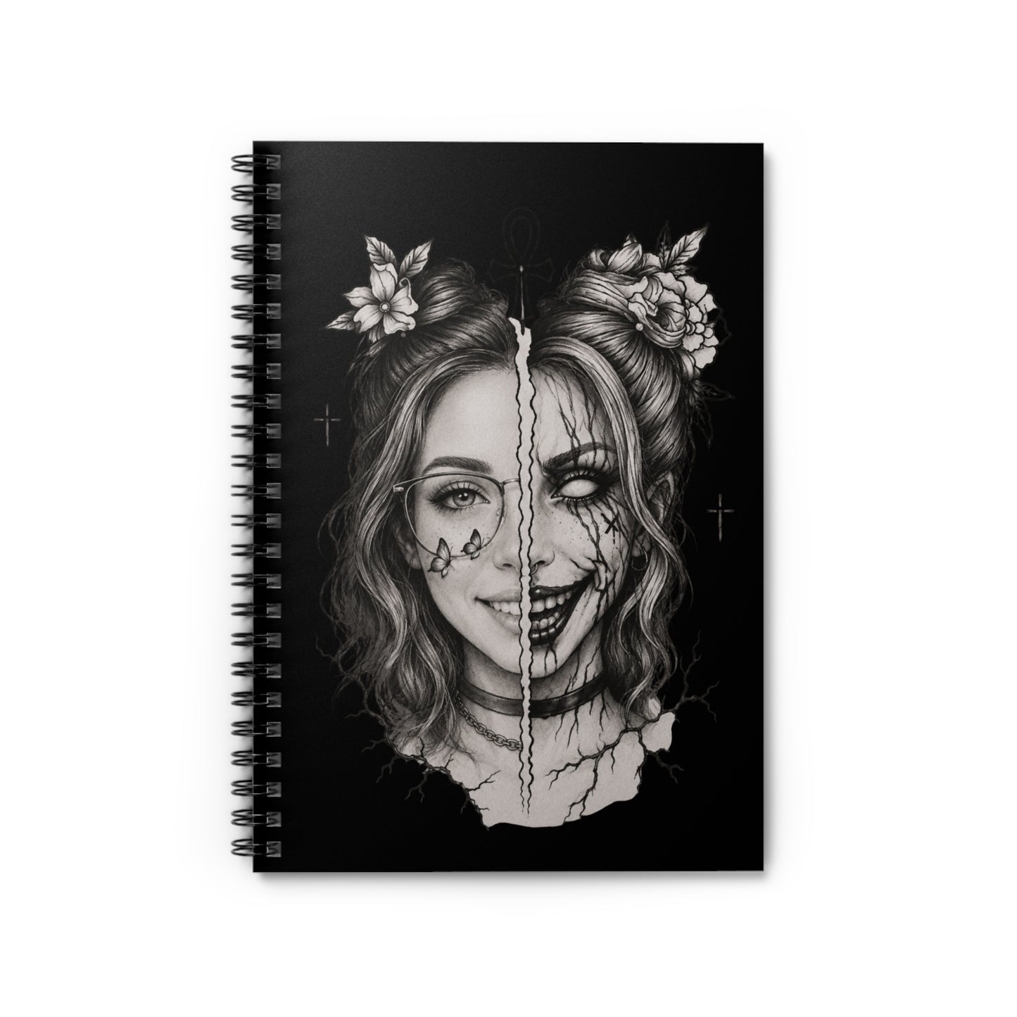 Spiral-bound notebook with a black and white illustration of a face on the cover