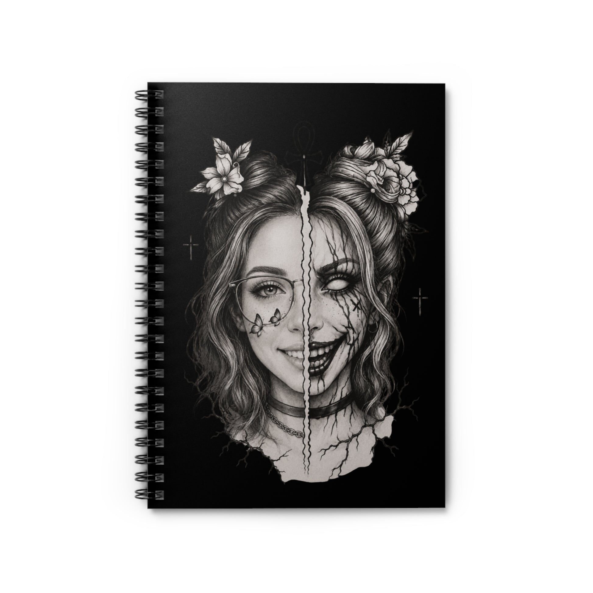 Spiral-bound notebook with a black and white illustration of a face on the cover
