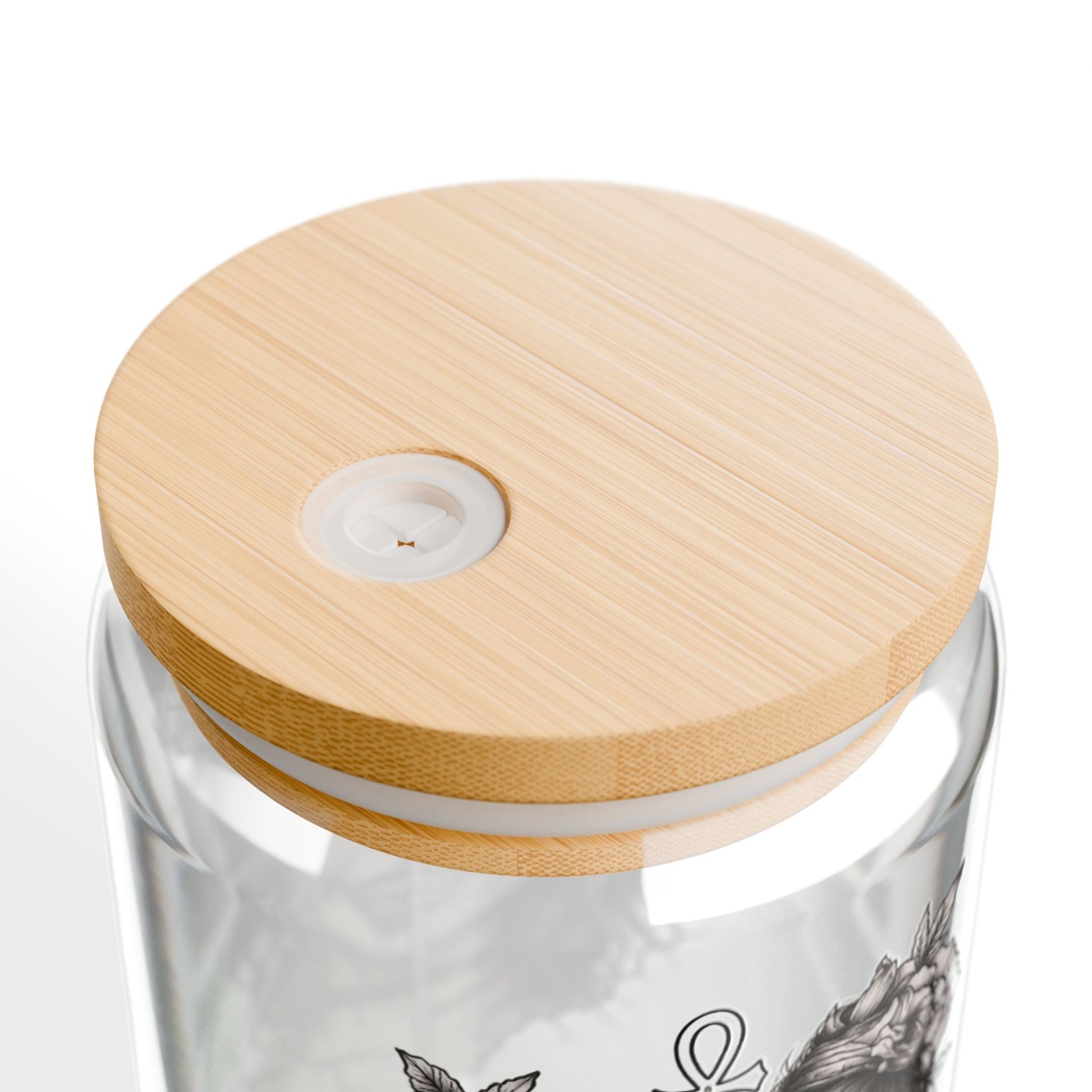 Clear glass container with a wooden lid on a white background