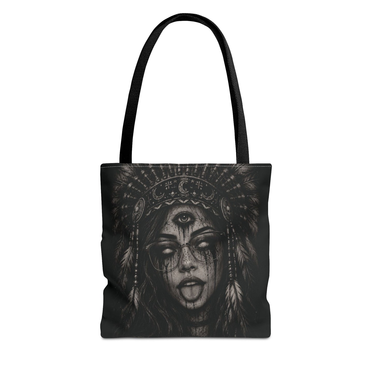 Tote bag with black and white design of a woman's face with feathers on a white background